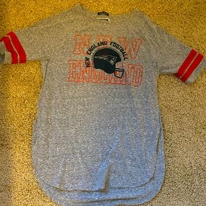New England Patriots size small women’s short sleeve shirt with side slits